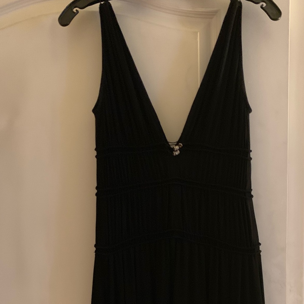 Like new BCBGMaxAzaria Grecian style tiered black dress